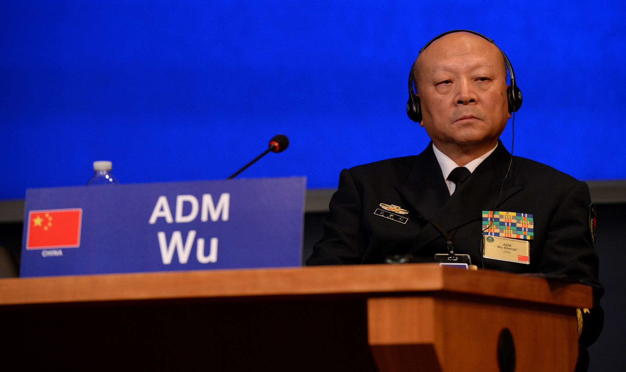 140917-N-PX557-400 NEWPORT, R.I. (Sept. 17, 2014) Commander in Chief of the People's Liberation army navy of the People's Republic of China Adm. Wu Shengli participates in the “Future Trends in Maritime Security” discussion panel during the Chief of Naval Operations’ 21st International Seapower Symposium (ISS) at U.S. Navy War College in Newport, Rhode Island. More than 170 senior officers and civilians from more than 100 countries, including many of the senior-most officers from those countries’ navies, are currently attending the biennial event Sept. 16-19. This year’s theme is “Global Solutions to Common Maritime Challenges,” and will feature guest speakers and three panel discussions to explore shared global concerns: "Future Trends in Maritime Security," "Maritime Implications of Climate Change," and "Enhancing Coalition Operations." First held in 1969, ISS has become the largest gathering of maritime leaders in history and provides a forum for senior international leaders to create and solidify solutions to shared challenges and threats in ways that are in the interests of individual nations. (U.S. Navy photo by Chief Mass Communication Specialist James E. Foehl/Released)