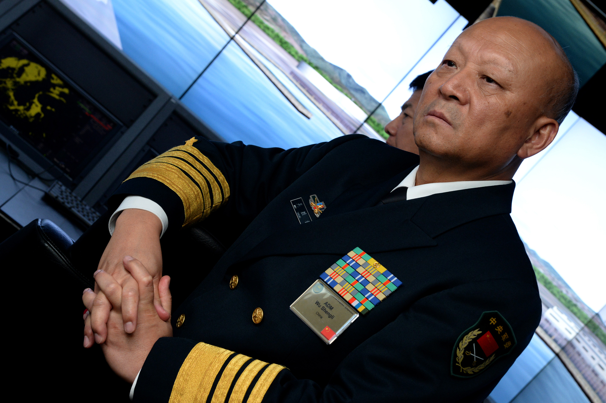 140918-N-PX557-223 NEWPORT, R.I. (Sept. 18, 2014) Commander in Chief of the People's Liberation army navy of the People's Republic of China Adm. Wu Shengli tours the Surface Warfare Officers School (SWOS) onboard Naval Station Newport in Newport, Rhode Island. Capt. Dave Welch, commanding officer, SWOS, provided a tour of the school for Shengli and his staff members who are currently in Newport attending the Chief of Naval Operations’ 21st International Seapower Symposium (ISS) at U.S. Navy War College. More than 170 senior officers and civilians from more than 100 countries, including many of the senior-most officers from those countries’ navies, are currently attending ISS, Sept. 16-19. SWOS provides a continuum of professional education and training in support of surface Navy requirements that prepares officers and enlisted engineers to serve at sea. (U.S. Navy photo by Chief Mass Communication Specialist James E. Foehl/Released)