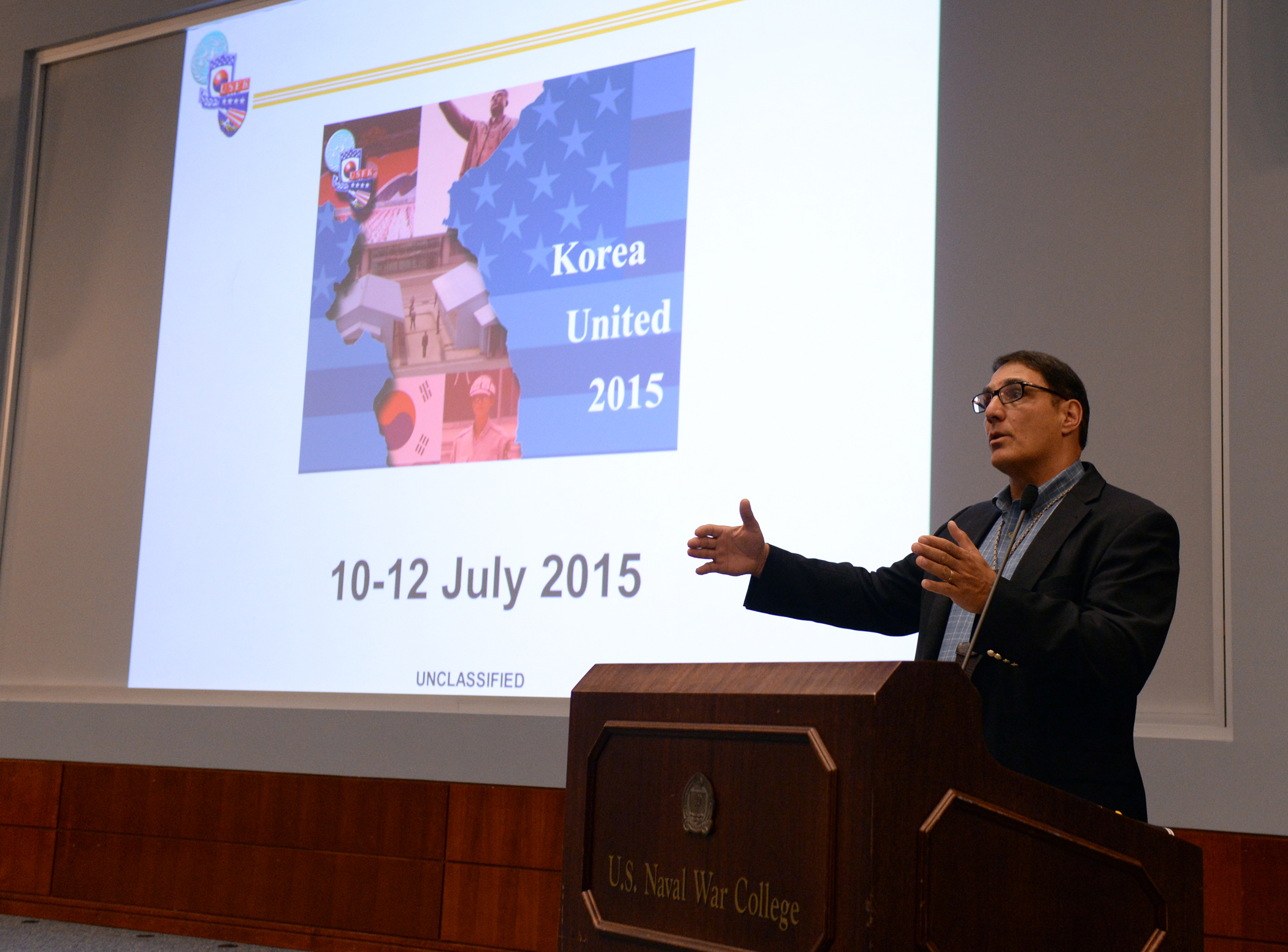 150710-N-PX557-049 NEWPORT, R.I. (July 10, 2015) Thomas Culora, dean, Center for Naval Warfare Studies at U.S. Naval War College (NWC), kicks off the Korea United (KU) 2015 War Game at NWC in Newport, Rhode Island. Sponsored annually by U.S. Forces Korea Detachment 102, this three-day operational, strategic-level event seeks to familiarize reserve, National Guard and active duty members with the command and control structure of Korea. (U.S. Navy photo by Chief Mass Communication Specialist James E. Foehl/Released)