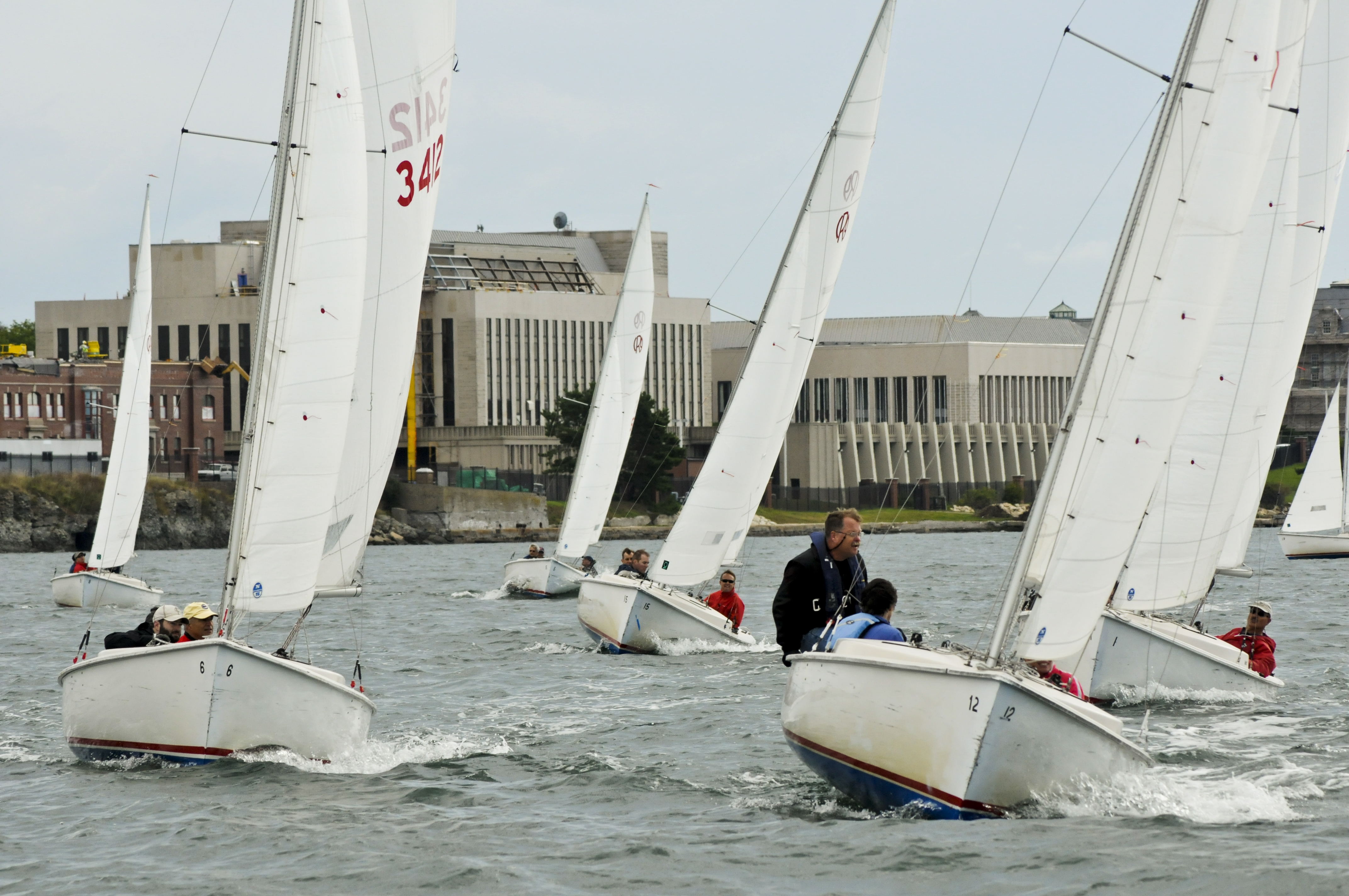 NEWPORT, R.I. (Sept. 21, 2012) Racers from the U.S. Naval War College (NWC) sailing team compete in a race on Narragansett Bay. The race was part of the Presidents Cup, a series of sporting events for NWC students and faculty. (U.S. Navy photo by Mass Communication Specialist 1st Class Eric Dietrich/Released)